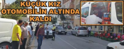 KK KIZ OTOMOBLN ALTINDA KALDI