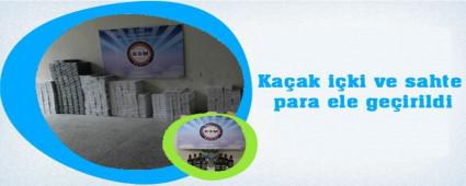 Ka�ak i�ki ve sahte para ele ge�irildi
