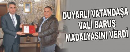 DUYARLI VATANDA�A VAL� BARU� MADALYASINI VERD�