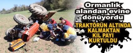 TRAKT�R�N ALTINDA KALMAKTAN KIL PAYI KURTULDU