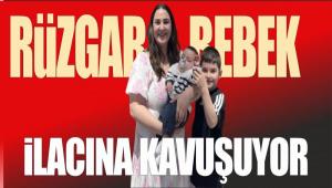 R�ZGAR BEBEK �LACINA KAVU�UYOR